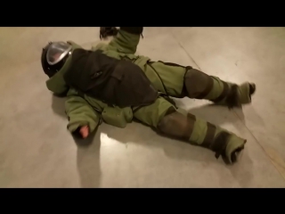 the girl tried on a 36-kilogram sapper suit