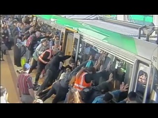 in australia, passengers tilted a train to save a man.